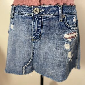 Amethyst Denim Distressed Miniskirt